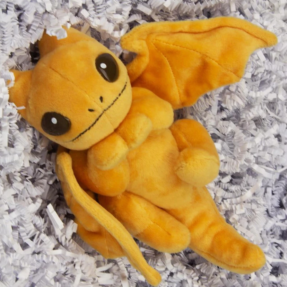 Peluche Little Embers de 7 pulgadas con extremidades móviles y manos magnéticas | Chispas (naranja) Foto 3 de 4