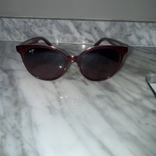 Maui Jim Mehana sunglasses feature a raspberry acetate frame and polarized