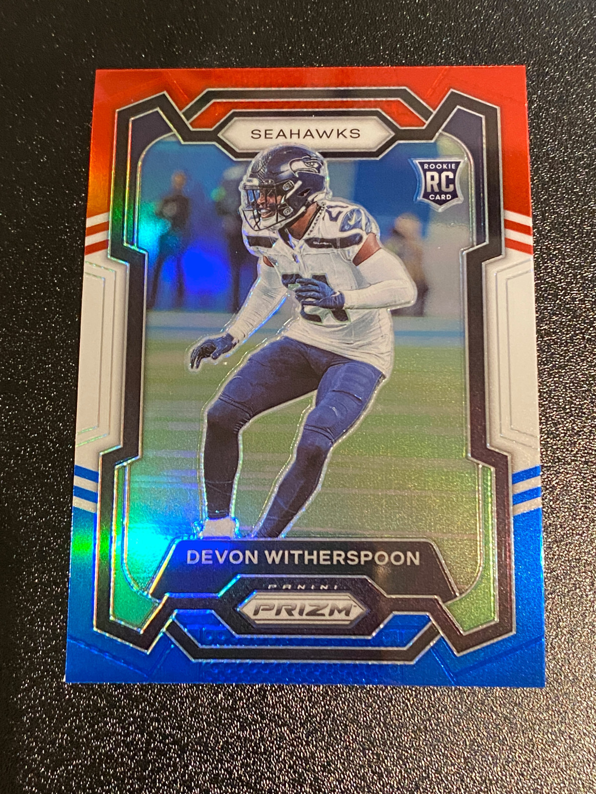2023 Panini Prizm Devon Witherspoon RED WHITE & BLUE PRIZM ROOKIE #389 Seahawks