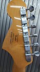 Yellow SQUIER VATAGE MOD JAGER electric guitar with silver hardware and four pickups, showing Fender logo on neck.