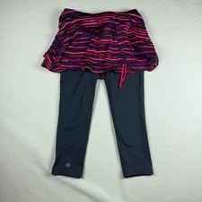 Leggings con falda Athleta Skapri XS rosa púrpura rayas Capri 919089 ropa deportiva
