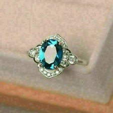 3Ct Oval Cut Blue Topaz Halo Women's Engagement Ring 14k White Gold Plated