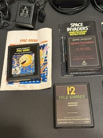 Original Atari 2600 Console, Joystick, Paddles, 7 Games CX2600A, paperwork, more