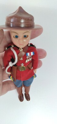 Canadian Mounty Souvenir doll with closing eyes vintage