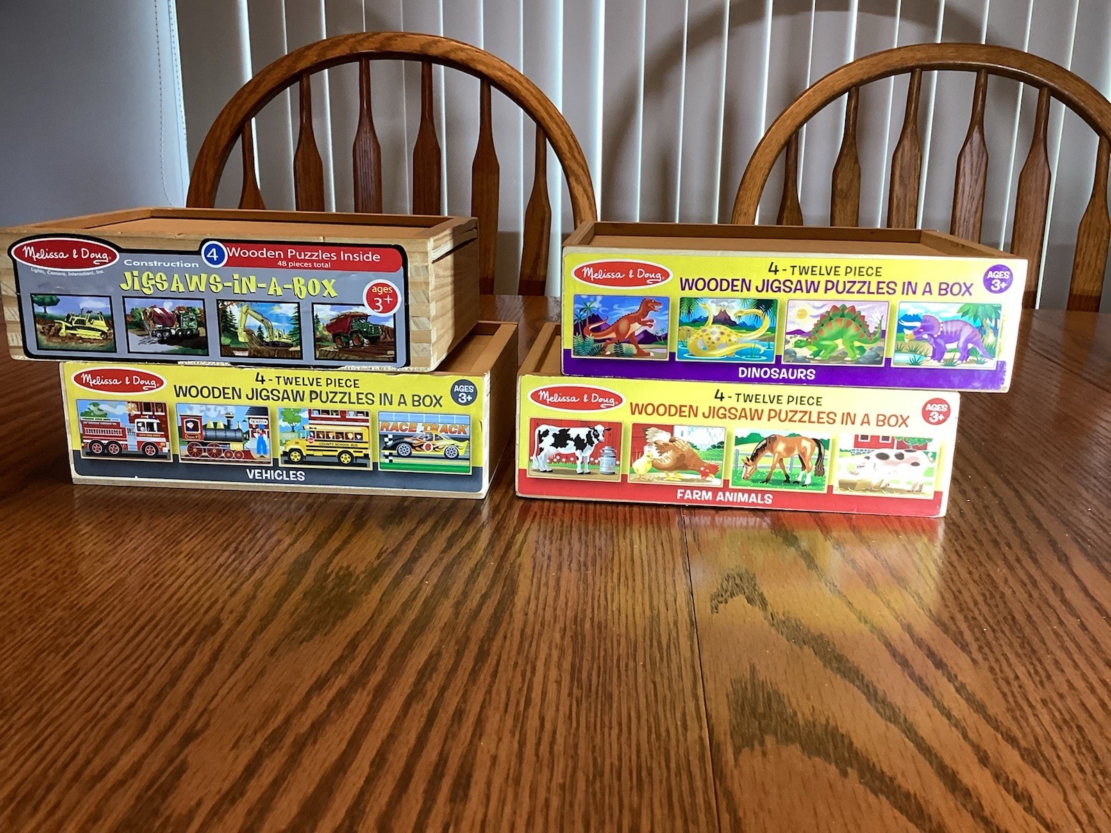 4 Wooden Puzzles in a Box by Melissa and Doug - 4 boxes = 16 puzzles.  Pre owned
