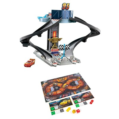 (1) Cars Rust-Eze Racing Tower with (1) Thunde Hollow Mud Madness Game Set