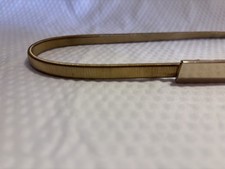Vtg 80s gold womens stretch belt 23 inch bar clasp marked DK-781
