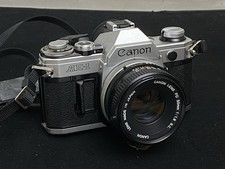 ANOTHER PRISTINE VINTAGE CANON AE-1 WITH FD 50MM F/1.8 S.C. LENS - SILVER BODY