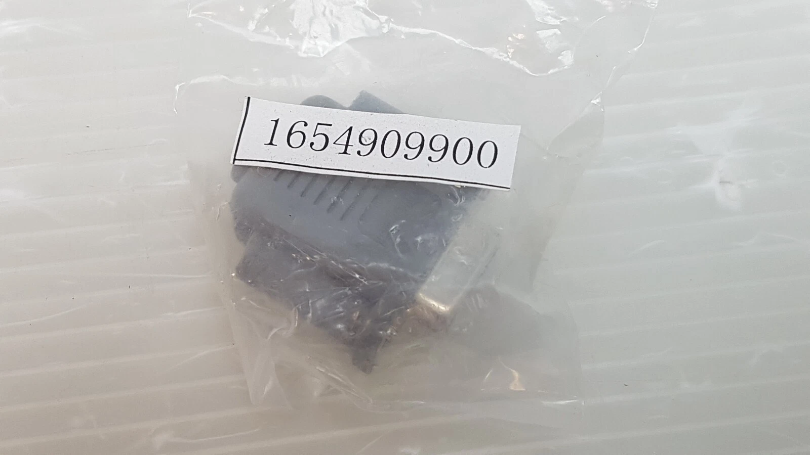 Bagged DB9 adapter with tag 1654909900