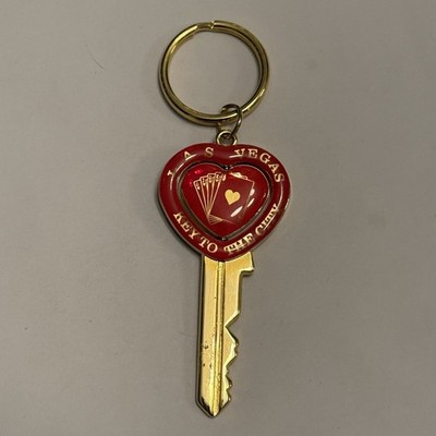 GOLD TONE RED HEART SHAPED LAS VEGAS KEY SHAPED WITH SPINNER KEYCHAIN