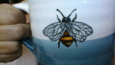 Heartland Hive Nice Blue & White Coffee Mug with Bumble Bee on front
