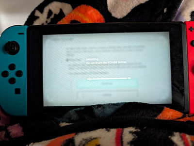 Nintendo Switch HAC-001(-01) Console w/ Neon Red/Blue Joy-Con Controllers