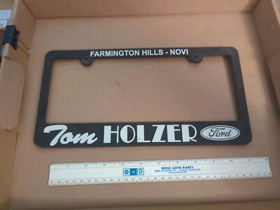 Vintage License plate frame dealership Michigan Tom Holzer Ford Farmington Novi