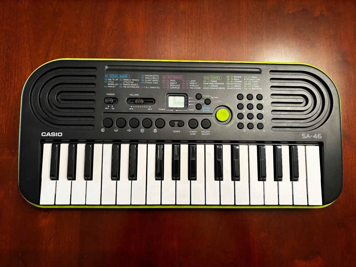 Casio SA-46 Mini Keyboard, Black & Green 32 Keys 100 Tones 50 Rhythms, pre-owned