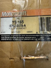 1990-2003 RANGER AEROSTAR 3.0L IDLER PULLEY WITH BRACKET OEM FORD NOS