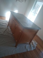 lightly used custom sewing table with cabinets