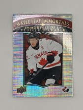 2025-26 UD TIM HORTONS TEAM CANADA MAPLE LEAF IMMORTALS NATHAN MACKINNON ML-2