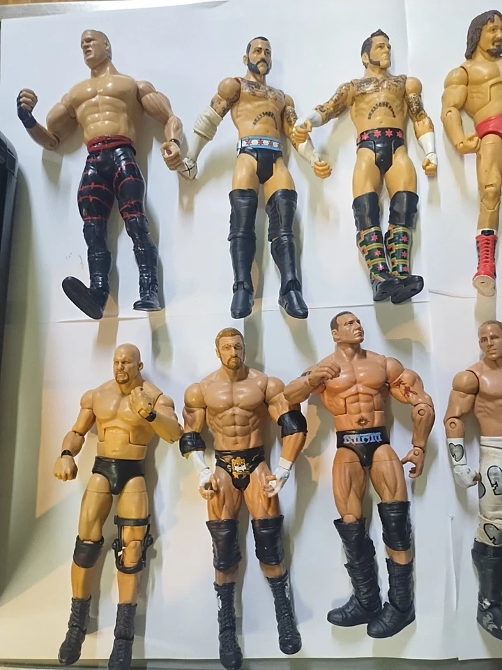 Lote de 12 figuras WWE Mattel, Jakks CM Punk, Stone Cold, mal estado Foto 2 de 3