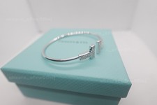 Gift.Tlffany Co18k.bracelet in white gold and diamonds