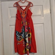 Size small Red midi dress with facial portrait, butterfly & embroidered front.