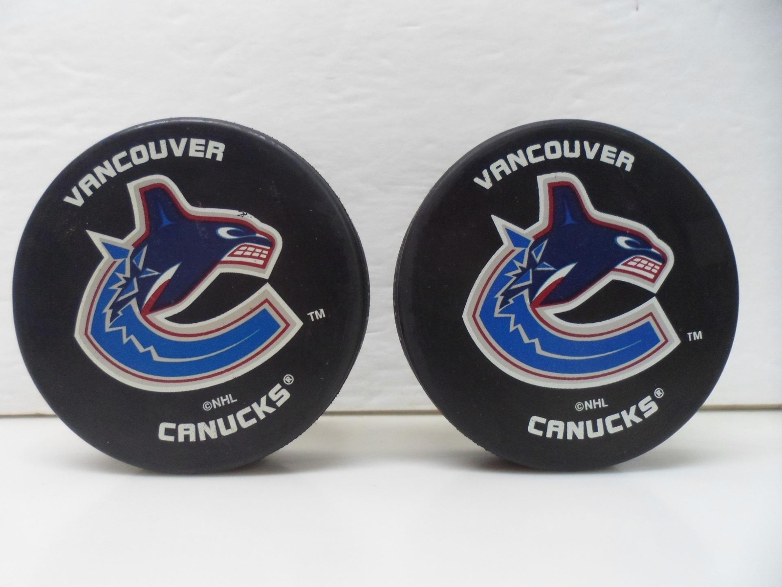 2 Vintage Vancouver Canucks NHL Hockey Pucks Made In Slovakia eBay