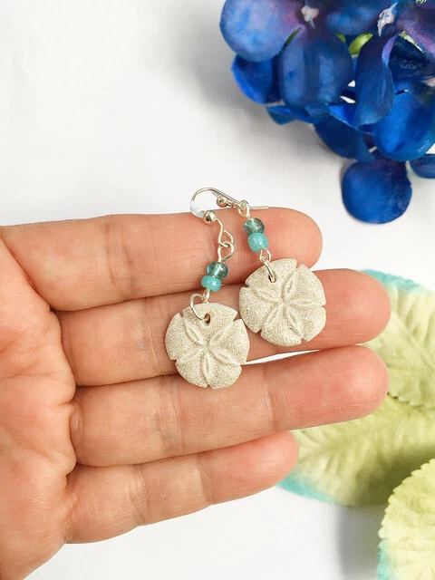 Sand dollar dangle best sale earrings