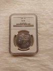 1885 Morgan Silver Dollar $1 - NGC AU58