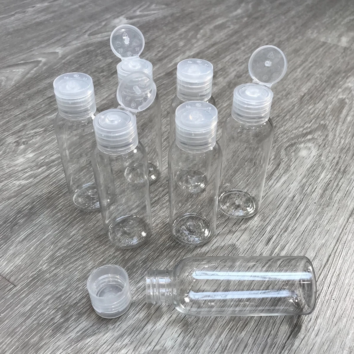 50ml SMALL STRONG ROUND PLASTIC BOTTLES SCREW FLIP TOP LID TRAVEL BOTTLE  LIQUID