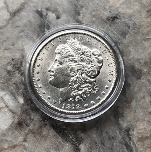 1878-CC Morgan Silver Dollar In Uncirculated Condition.