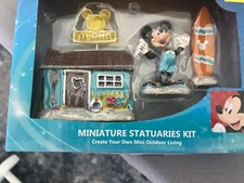 mickey figurine and pool accessories bundle