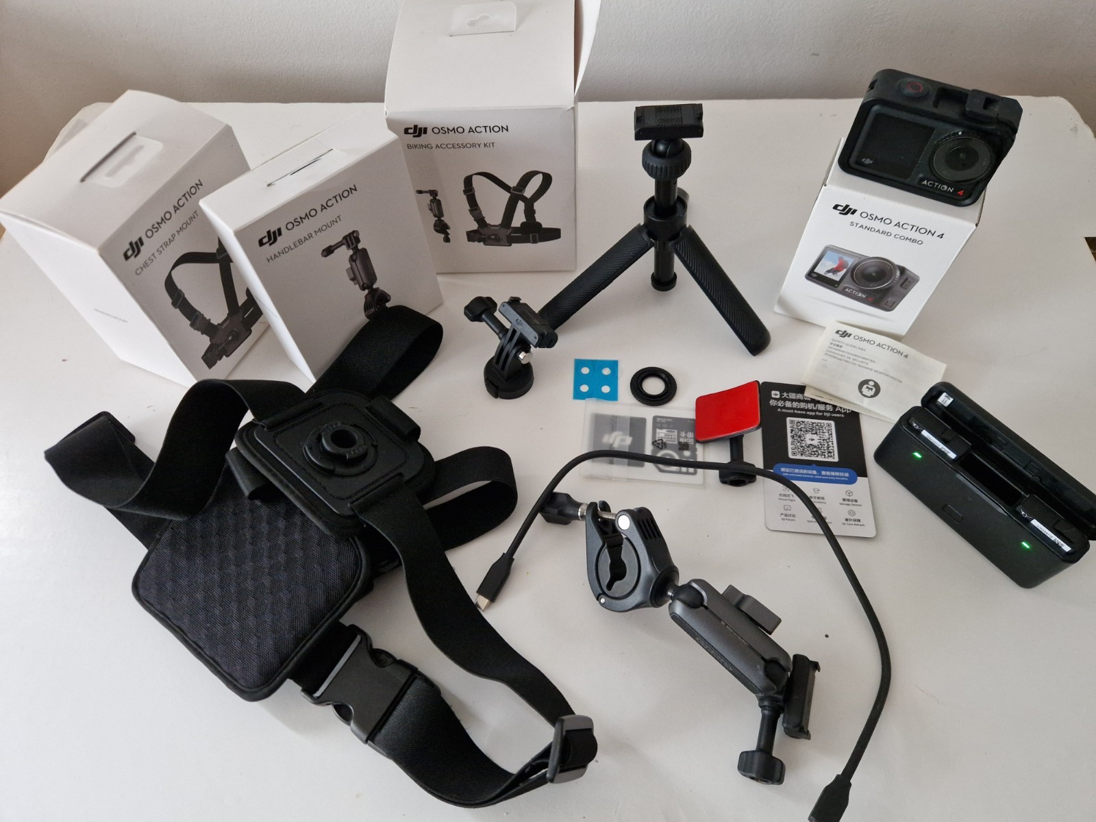 DJI Osmo Action 4 With Tripod, Extra Batteries , Handlebar Mount, Chest Mount