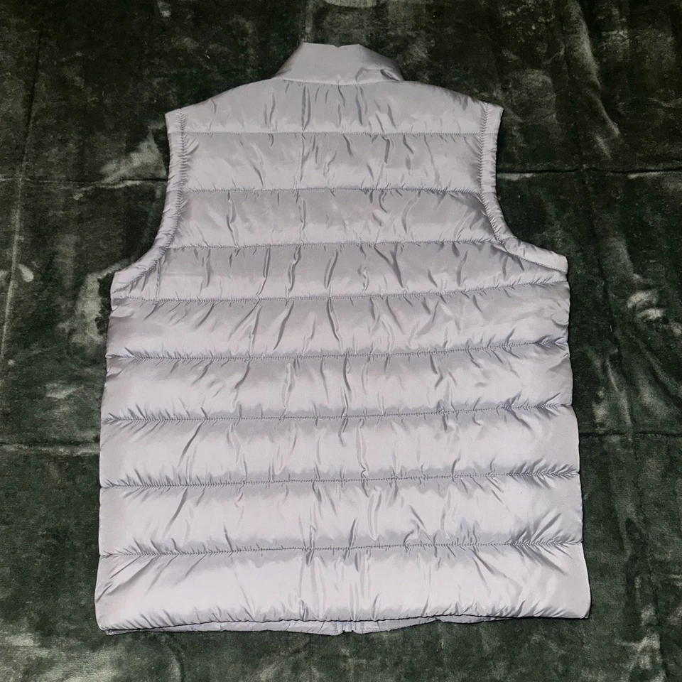 Chaleco acolchado Michael Kors para hombre gris medio plumón informal cuello falso cremallera completa Foto 2 de 4