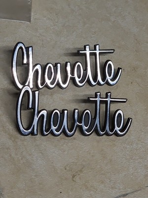 NOS 1970S CHEVROLET CHEVETTE FRONT FENDER EMBLEMS GM