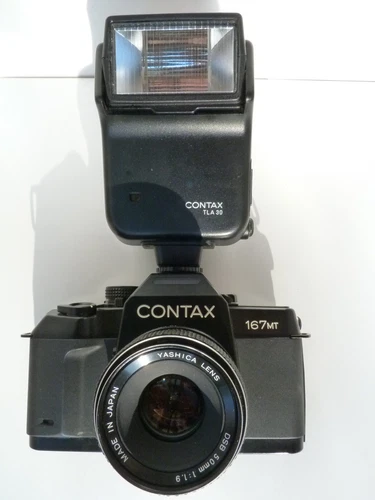CONTAX 167MT 35mm Black SLR CAMERA,YASHICA MC 50/1.9 lens. CONTAX TLA 20 fl.READ