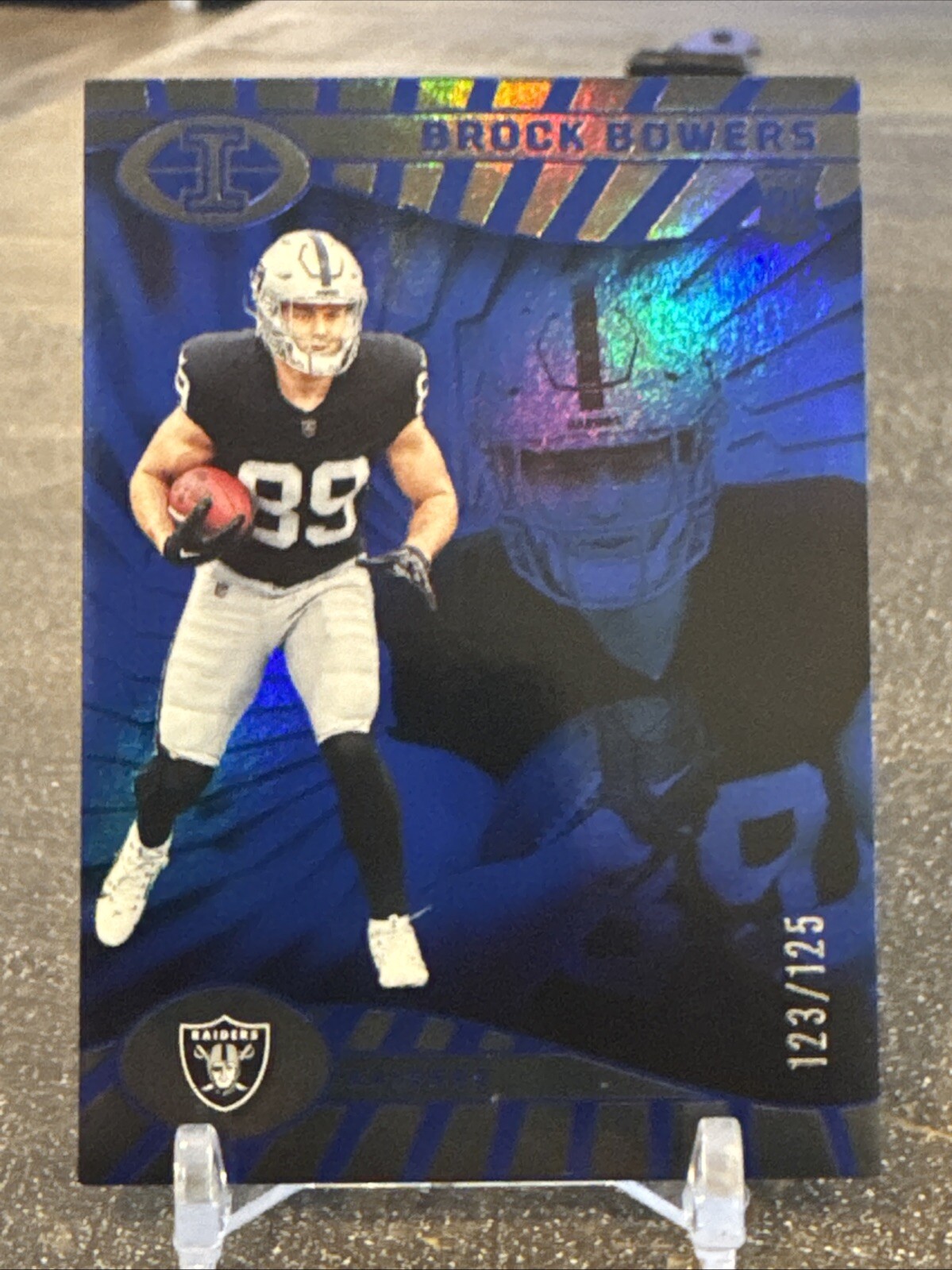 2024 Panini Illusions - Brock Bowers #47 (RC) Trophy Collection Blue /125