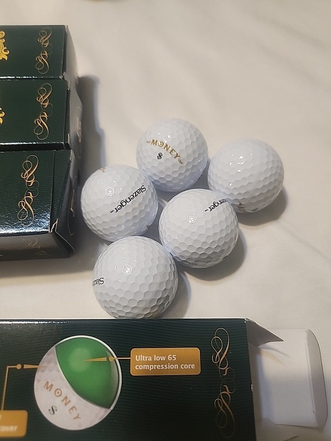 Slazenger Money Ultra Low 65 Compression Core Golf Balls- 4 Packs of 5 Balls