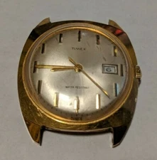 Timex Base Metal Bezel Stain.Steel Back Dust/Water Res 21G42570 Gold tone