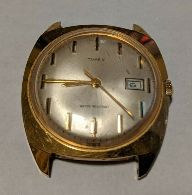 Timex Base Metal Bezel Stain.Steel Back Dust/Water Res 21G42570 Gold