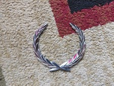 1980-1992 Cadillac Fleetwood Deville Brougham Chrome Trunk Lock Wreath Emblem 1980-1992 Cadillac Fleetwood Deville Brougham Chrome Trunk Lock Wreath Emblem