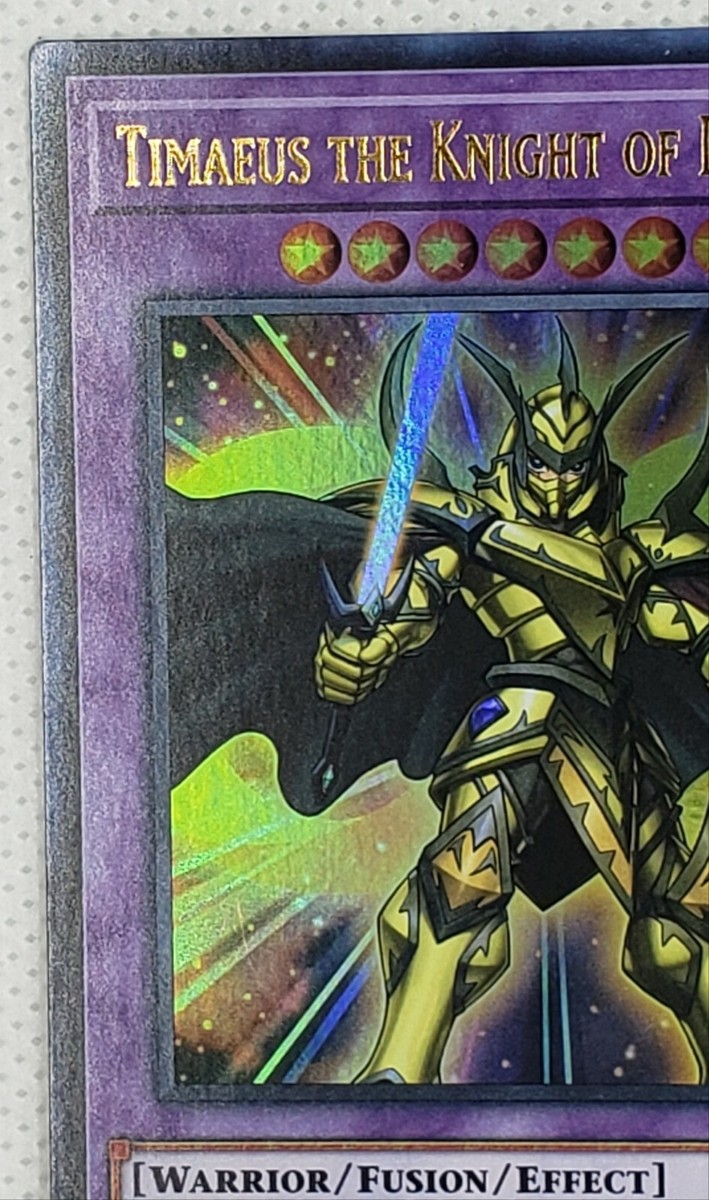 Yu-Gi-Oh Timaeus the Knight of Destiny (Gold) 1st Edition Ultra DLCS-EN054