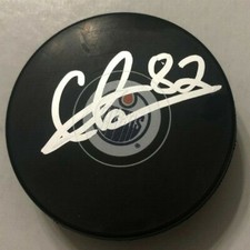 CALEB JONES SIGNED EDMONTON OILERS HOCKEY PUCK W/ CASE COA
