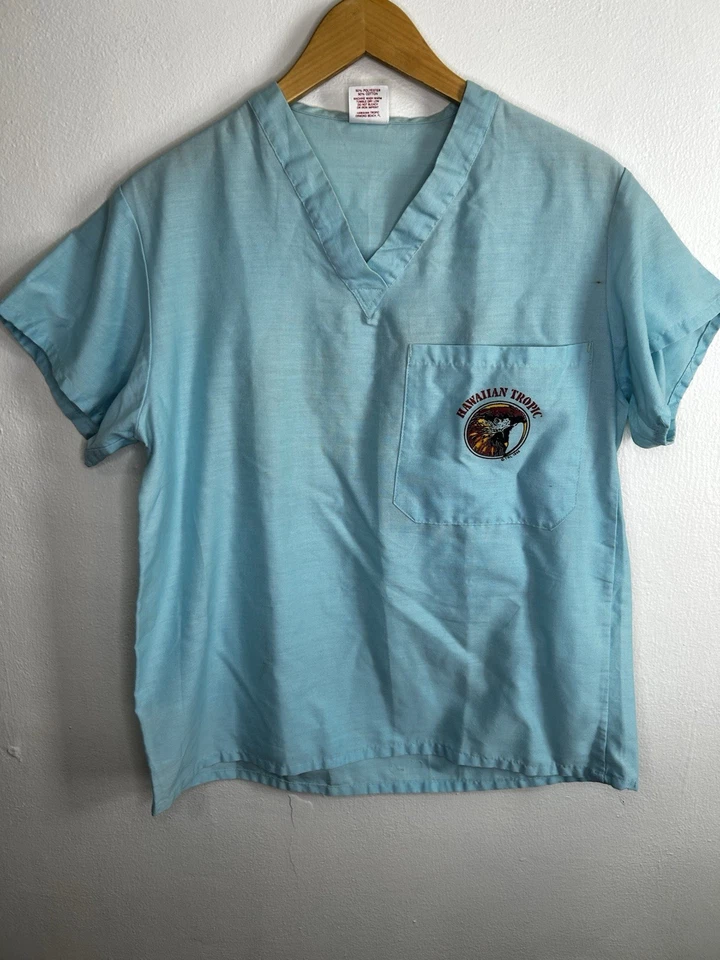 Camisa de Colección 1986 Hawaiian Tropic Cuello en V Talla Mediana Hecha en EE. UU. Azul Claro Foto 2 de 4