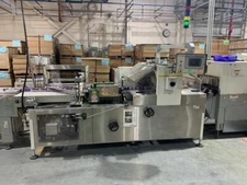 TEXWRAP T - 205 HIGH SPEED ORBITAL SERVO SIDE SEAL* SHRINK SYSTEM