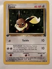 PSA 7 Pokemon TCG Team Rocket 1st Edition Eevee WOTC NEAR MINT Never Played