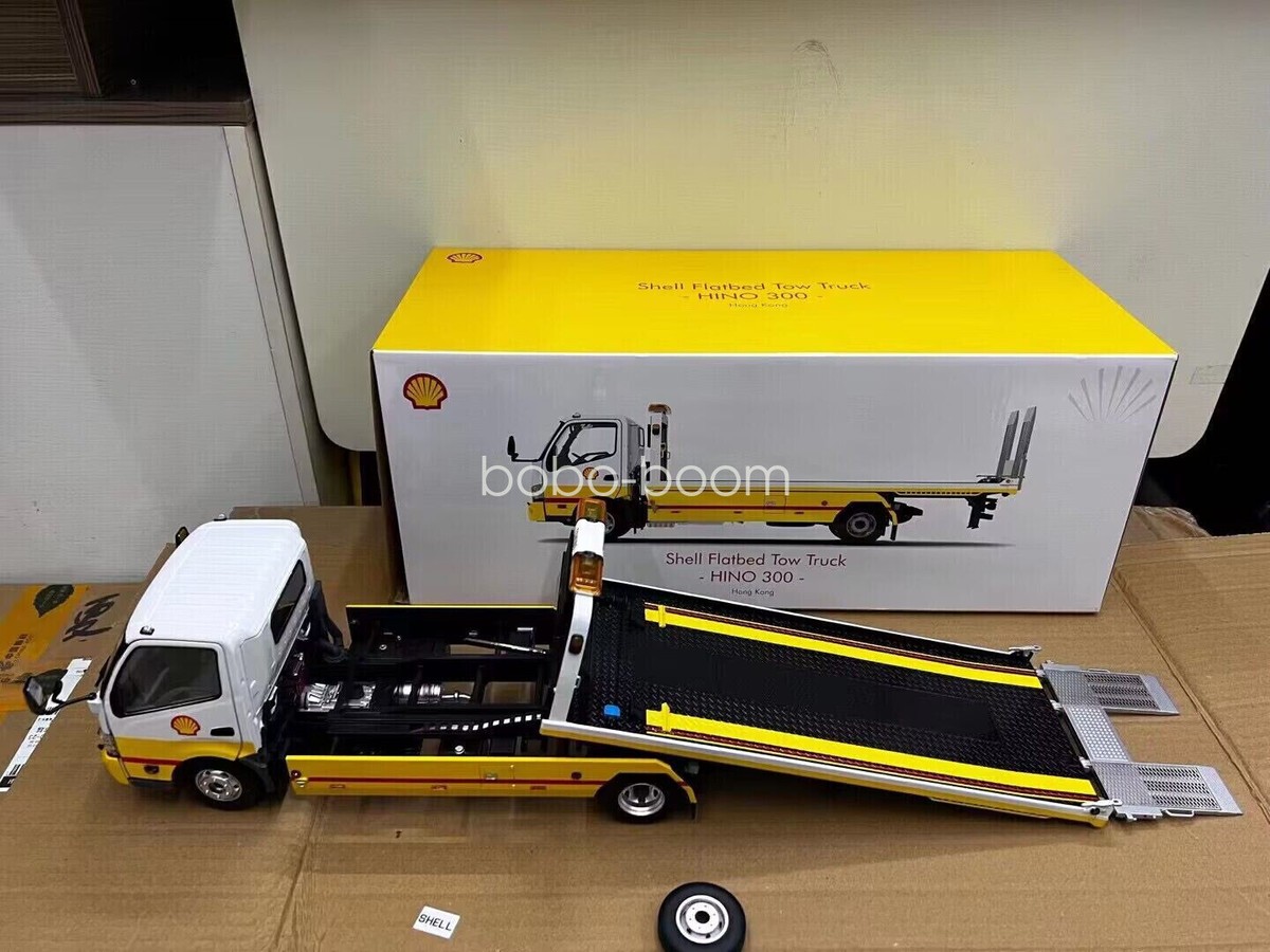 Diecast Hino 300 Shell Flatbed Tow Truck Yellow by TINY 1/18 Diecast Hino 300 Shell Flatbed Tow Truck Yellow by TINY 1/18