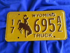 Love this one!! EXPIRED 1983 GOLD 17 695 AZ TRUCK WYOMING LICENSE PLATE