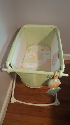 fisher price wooden bassinet