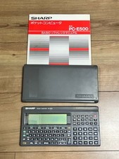 Sharp PC-E500 pocket computer with manual tested used
