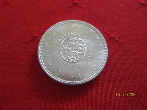 1964 -  SILVER  DOLLAR  COIN FROM CANADA - NICE HIGH GRADE CONDITION - UNC