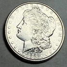 1886 Morgan silver dollar. Very choice AU-UNC slider.. $1.  #ro1
